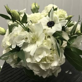White floral bouquet with anemones and hydrangeas