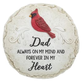Round memorial plaque with a red cardinal and the word Dad