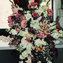 Tall spray of pink and white mixed flowers with lilies and daisies