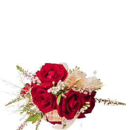 Red roses with small white flowers and gold ribbon accents