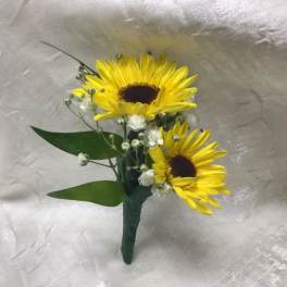 Two yellow sunflowers with small white filler flowers