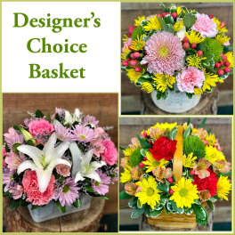 Three colorful basket flower arrangements with mixed blooms