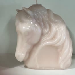 Glossy pale pink horse head figurine