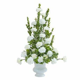 Tall white floral arrangement in a white vase
