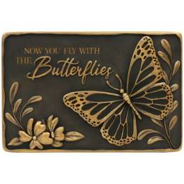 Decorative plaque with a butterfly and flowers on a dark background