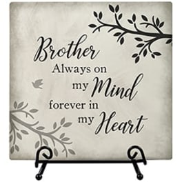 Decorative plaque reading "Brother Always on my Mind forever in my Heart" on a stand