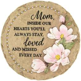 Round memorial plaque with pink flowers and a mother tribute message