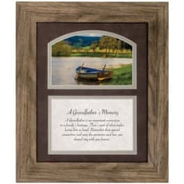 Framed memorial plaque with a landscape photo and printed tribute text