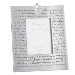 Silver memorial photo frame with engraved text and a heart accent