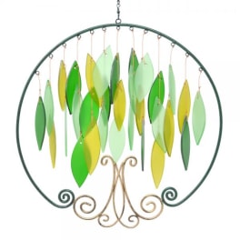 Decorative hanging metal circle with green and yellow leaf-shaped pieces