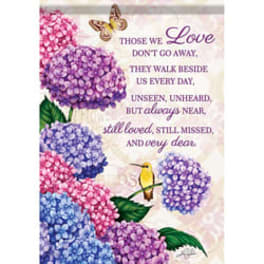 Hydrangea-themed memorial sign with purple text and butterflies