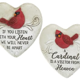 Two heart-shaped memorial plaques with red cardinals and text.