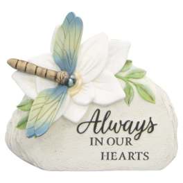 Decorative memorial stone with a dragonfly and the words "Always in our hearts"