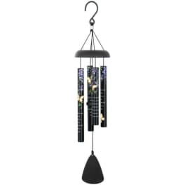Black wind chime with floral-printed tubes and a hanging clapper