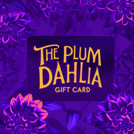 Purple gift card with yellow text reading The Plum Dahlia