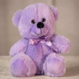 Lavender teddy bear with a satin ribbon bow