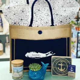 Gift bag with a candle, succulent whale planter, and coaster set