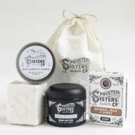 Gift set with soap, body butter, candle, and a drawstring bag