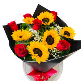 Bouquet of red roses and yellow sunflowers wrapped in black paper