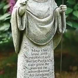Stone Saint Patrick garden statue holding a staff