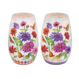 Pair of frosted glass candle holders with colorful flower and butterfly prints