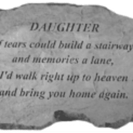 Stone plaque with a memorial quote engraved on it