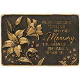 Decorative plaque with gold flowers and a memorial quote