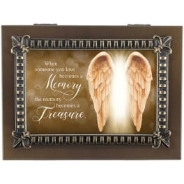 Memorial plaque with angel wings and a sympathy quote