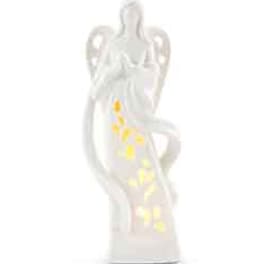 White angel figurine with yellow lights inside