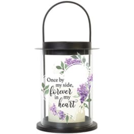 Black lantern with a memorial quote and purple floral design