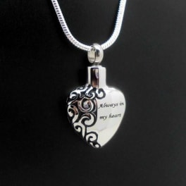 Heart-shaped silver pendant necklace with engraved text