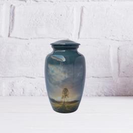 Dark blue urn with a landscape scene printed on the front