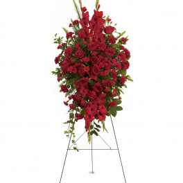 Tall red floral spray on a metal easel