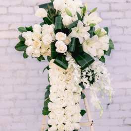 White rose and lily standing spray on an easel