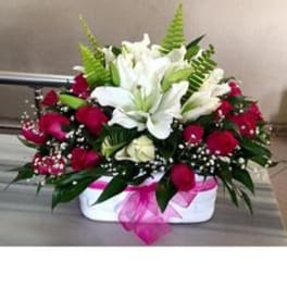 Red rose and white lily arrangement