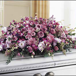 Large pink and purple floral casket spray