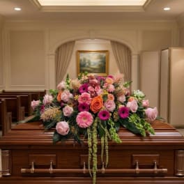 Elegant Blush & Sunset Casket Spray