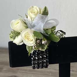 White rose bouquet with ribbon and black jeweled bracelet