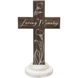 Wooden memorial cross with calla lily engraving on a white base