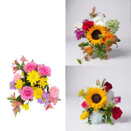Three mixed bouquets with sunflowers, roses, and daisies