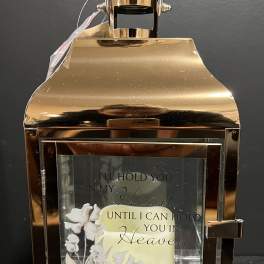 Gold lantern with a sympathy message and floral print insert