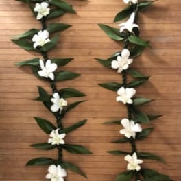 Double Ti leaf lei with orchid blooms