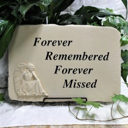 Memorial plaque with angel relief and the words Forever Remembered Forever Missed