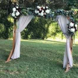 Wooden Arch with Flowers and Greenery Garland