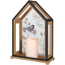 House-shaped wooden lantern with a candle and memorial bird print