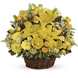 Yellow flowers in wicker basket