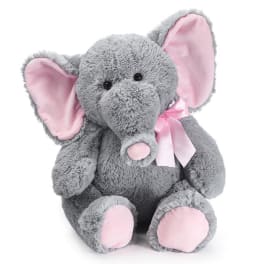 Gray plush elephant with pink ears and ribbon