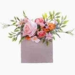 Pink and orange floral arrangement in a square box