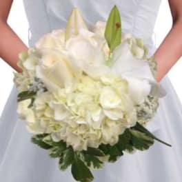 White bridal bouquet with lilies and hydrangeas