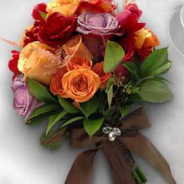 Bouquet of multicolored roses tied with a brown ribbon